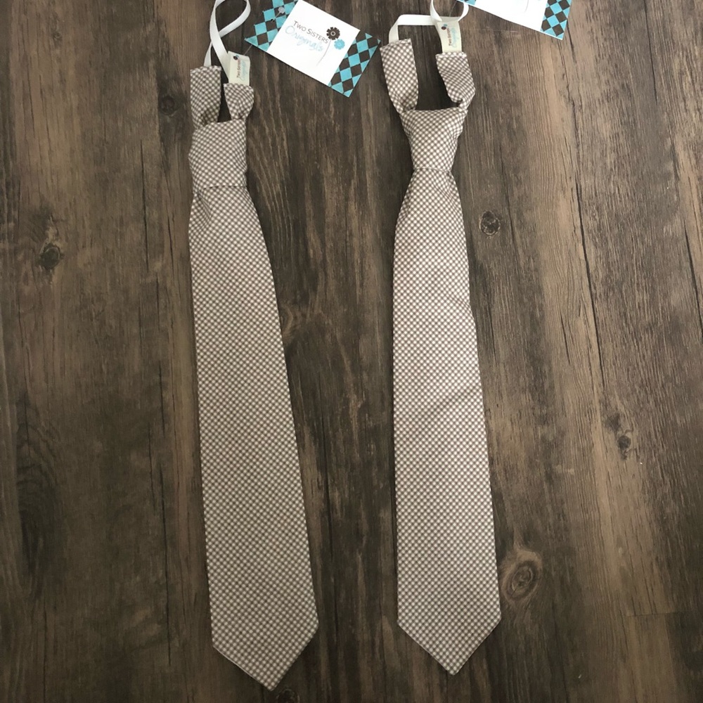 Set of 2 boys neck ties with elastic neck band.